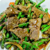 Green Bean Beef · Beef sauteed with fresh green beans, carrots, and onions in special black bean sauce.
