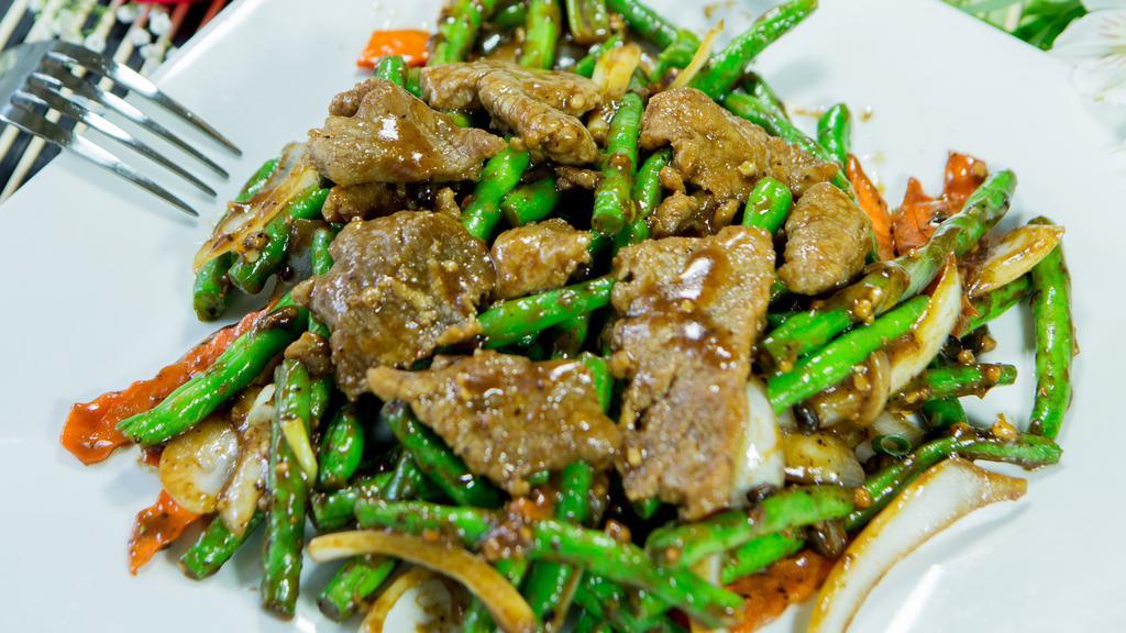 Green Bean Beef · Beef sauteed with fresh green beans, carrots, and onions in special black bean sauce.