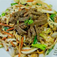 Mu Shu Beef · Beef slices with scrambled egg, cabbage, onions, carrots and stir-fried in house sauce. Opti...