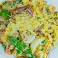Bbq Pork Chow Dan · Scrambled eggs, sliced BBQ pork, mushrooms, onions, carrots, water chestnuts, beansprouts, a...