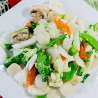 Scallops With Vegetables · Scallops stir-fried with Chinese cabbage, mushrooms, water chestnuts, onions, and snow peas ...