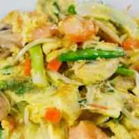 Shrimp Chow Dan · Scrambled eggs, shrimp, mushrooms, onions, carrots, water chestnuts, beansprouts, and snow p...