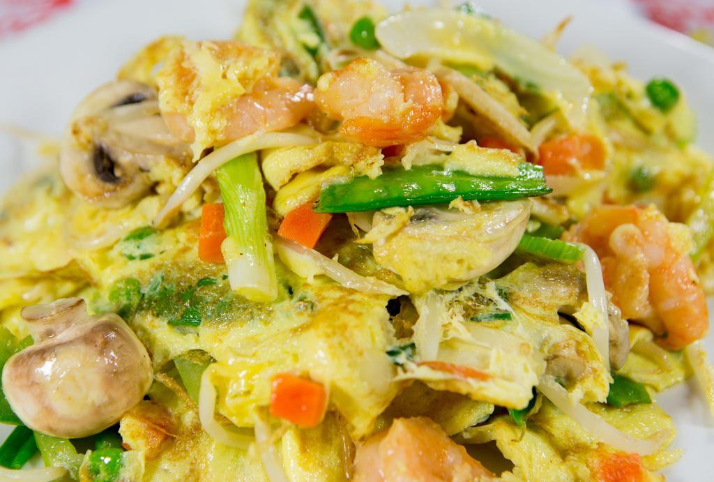 Shrimp Chow Dan · Scrambled eggs, shrimp, mushrooms, onions, carrots, water chestnuts, beansprouts, and snow peas.