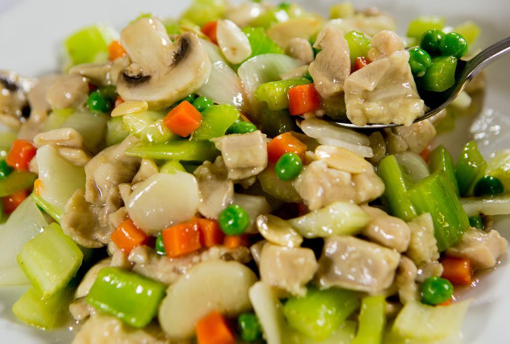 Chicken Subgum Chop Suey · Chicken, celery, mushrooms, onions, peas, carrots, water chestnuts, and almonds in a light sauce.