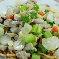 Pork Subgum Chop Suey · Pork, celery, mushrooms, onions, water chestnuts, peas, carrots, and almonds in a light sauc...
