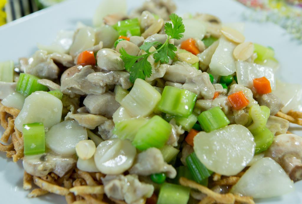 Pork Subgum Chop Suey · Pork, celery, mushrooms, onions, water chestnuts, peas, carrots, and almonds in a light sauce. NO dry noodles