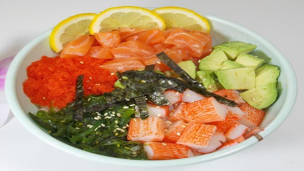 Poke Salmon Don · Imitation crab, salmon, avocado, tobiko, and seaweed salad over a bowl of rice and seasoning.