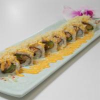 Shrimp Tempura Roll (8 Pcs.) · Shrimp tempura & avocado roll, topped with tempura flakes & spicy mayo.