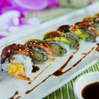 Dragon Roll (8 Pcs.) · Inside: tempura shrimp, cucumber, and crab salad Outside eel, avocado, tobiko and eel sauce.