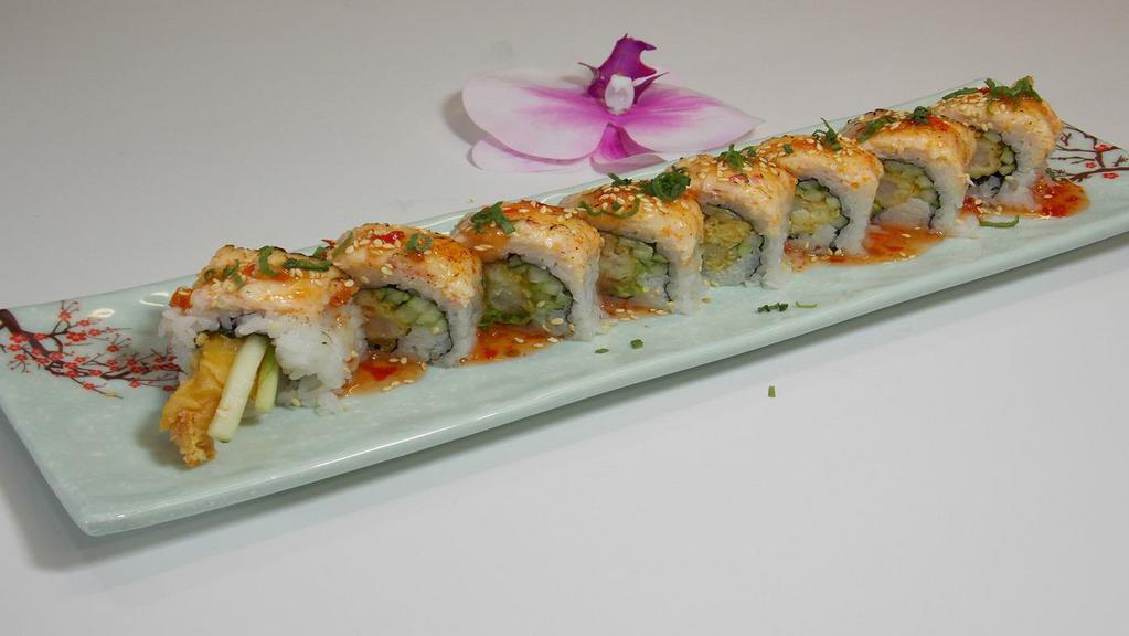 Double Shrimp Roll (8 Pcs.) · Avocado, cucumber, tempura shrimp, sweet chili sauce, green onions, topped with ebi (shrimp). Contains sesame seeds.