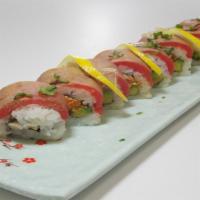 Monster Roll (8 Pcs.) · Spicy salmon, imitation crab mixture, avocado, seared ahi tuna, poke sauce, green onion, lem...