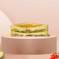 When Bacon Met Cado Vegan Grilled Cheese · Crispy vegan bacon, avocado slices, and melted vegan cheese placed in between two pieces of ...