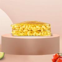 Mac Cheesin' Vegan Grilled Cheese · Classic vegan mac & cheese, and melted vegan cheese in between two pieces of bread grilled u...