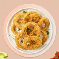 Over My Onion Rings · Sliced onions dipped in a light batter and fried until crispy and golden brown.