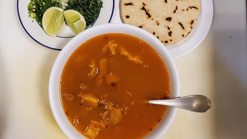 Menudo De Res  · Tradicional Mexican soup, made with beet tripe, garlic and spices. Served with corn tortilla