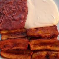 Platano Frito  · Fried plantain, served with beans and sour cream