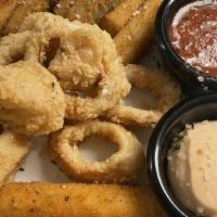 Factory Sampler · Can't go for just one? Enjoy our Calamari, fried mozzarella and fried zucchini.