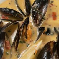 Steamed Clams Or Mussels  · In a garlic white wine sauce
in notes specify whether you'd prefer mussels or clams