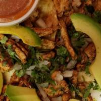 3 Chicken Tacos · Served on corn tortillas, with cilantro, onions, salsa picante and avocado slices, with Span...