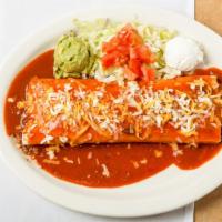 Burrito De Picadillo · A large flour tortilla filled choice of ground or shredded beef, smothered with red chili an...