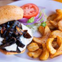 Mushroom Burger · Charbroiled half-pound beef burger topped with melted mozzarella cheese, marinated portobell...