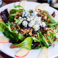 Apple Walnut Insalata · Field greens, candied walnuts, dried cranberries, and gorgonzola (an Italian blue cheese), t...