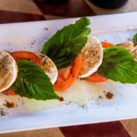 Tuscano'S Caprese · Vine-ripened tomatoes, sweet basil, and fresh mozzarella, drizzled with extra virgin olive o...