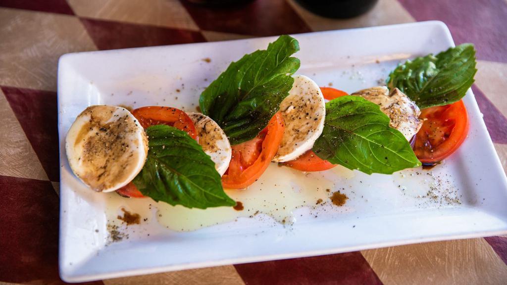 Tuscano'S Caprese · Vine-ripened tomatoes, sweet basil, and fresh mozzarella, drizzled with extra virgin olive oil and balsamic vinegar.