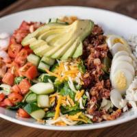 Seafood Cobb · Shrimp, crab, Roma tomatoes, avocado, egg, cucumbers, bacon, cheddar & pepper jack cheeses