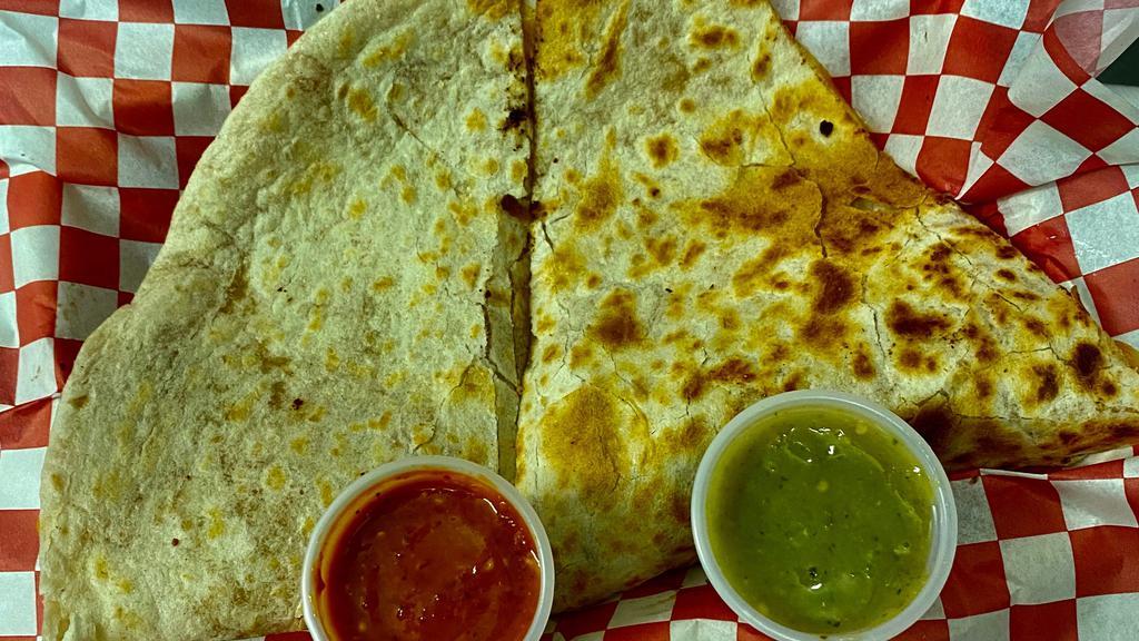Quesadillas · Melted cheese with your choice of meat or vegetarian options in a flour tortilla with a side of sour cream.
