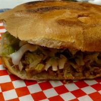 Tortas · Grilled Mexican bread with choice of meat or vegetarian topped with refried beans, lettuce, ...