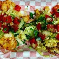 Seafood Tacos · Choice of grilled fish tilapia or shrimp. Topped with lettuce, cilantro, pico de gallo, and ...