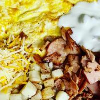 Breakfast Plates · Choice of meat or vegetarian with scrambled eggs, potatoes, sour cream and cheese,served wit...