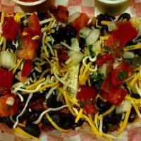 Vegetarian Tacos · Choice of filling. Topped with black beans, pico de gallo, and cheese.