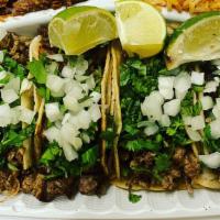 Taco Combo (4) · Four tacos choice of meat topped with cilantro and onions, or vegetarian topped with black b...