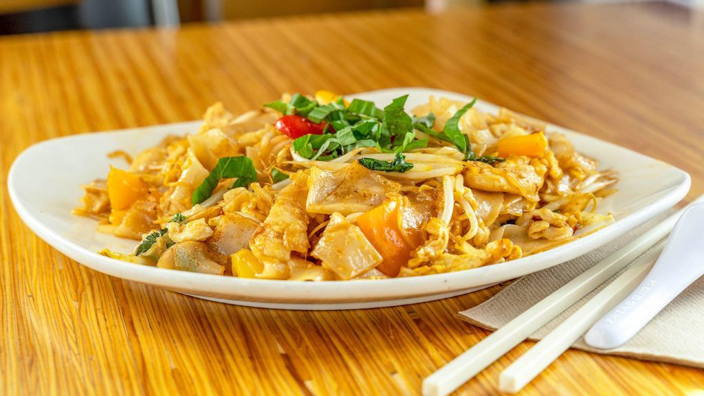 Drunken Noodles · Specialty. Wide rice noodle stir-fried with Chicken, onions, bell peppers and tomatoes in a house specialty spicy basil sauce