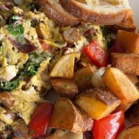 Protein Scramble · Sausage, Bacon, Kale, Comes with O’Brien Potatoes and Choice of toasted Bread
