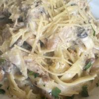 Chicken Fettuccini Pasta · Garlic Cream Sauce, Chicken, Mushrooms, Fettuccini Pasta.