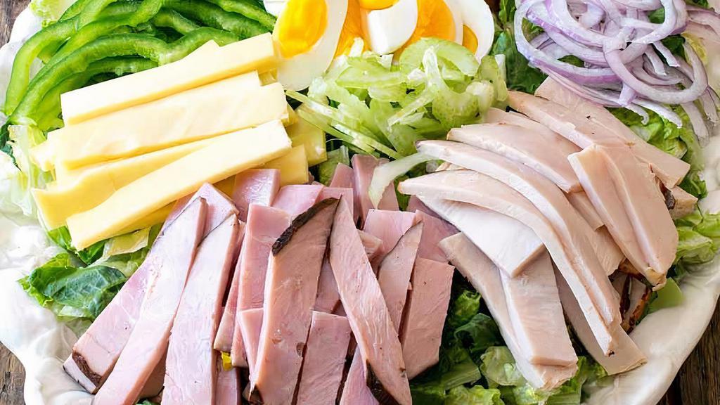 Chef Salad · Romaine Lettuce, Ham, Provolone, Banana Peppers, Tomatoes, Onion, Hard-Boiled Egg.
