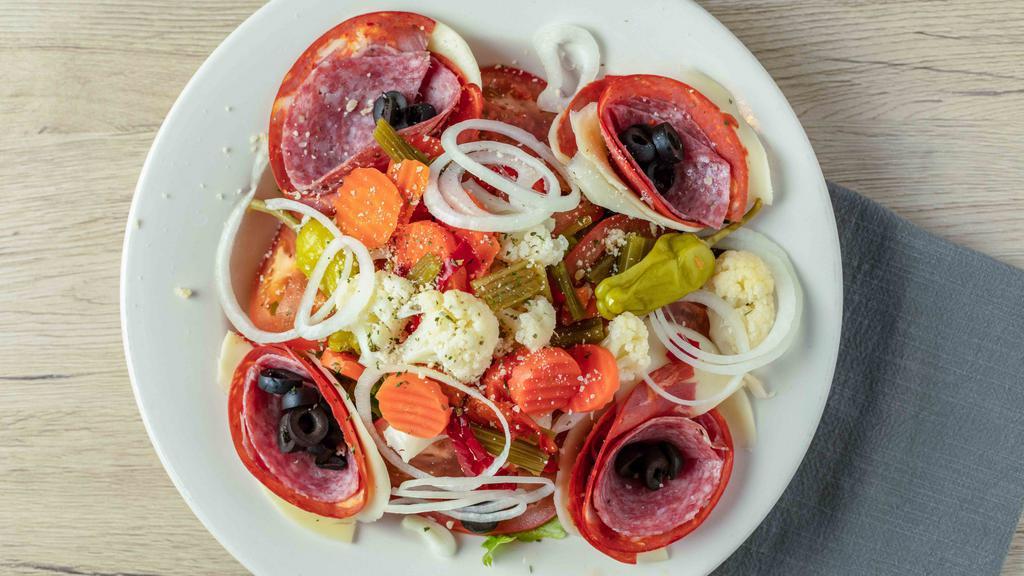 Antipasto Salad · Romaine Lettuce, Tomatoes, Capicola, Provolone, Salami, Onions, Giardiniera, Olives & Oregano.