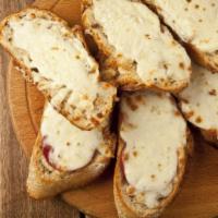 Garlic Bread With Cheese · Fresh baked garlic bread top.