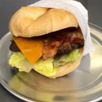 Bacon Burger · Char-broiled beef patty, topped with bacon, lettuce, tomatoes, onions and fry sauce on a toa...