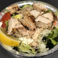 Grilled Chicken Salad · Grilled all white chicken breast served atop our Greek salad.