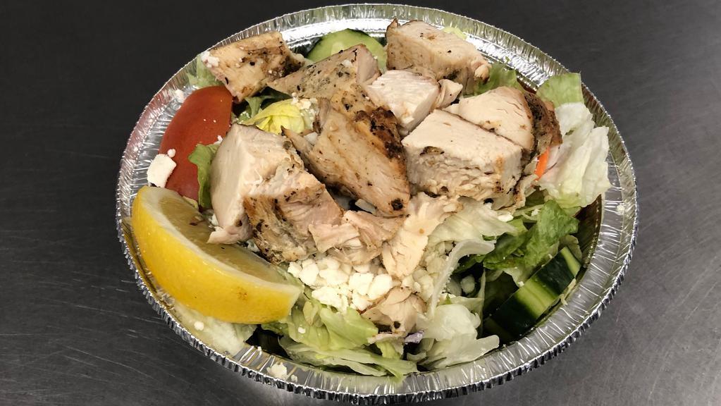 Grilled Chicken Salad · Grilled all white chicken breast served atop our Greek salad.