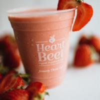Strawberry-Banana Creamsicle · Housemade almond milk blended with strawberries, banana, coconut butter, vanilla extract, an...