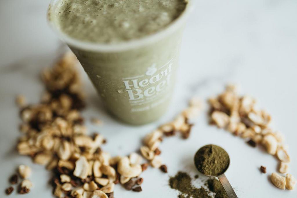 Celestial Sea · A coconut superfood smoothie made with 35 greens from the land and sea. Young coconut water and coconut meat, almond butter, dates, raw cacao, mint, and Vitamineral Green.