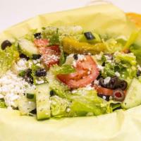 Greek Salad · Lettuce, tomatoes, cucumbers, pepperoncinis, black olives, and feta cheese. Served with your...