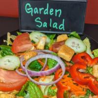 Garden Salad · Romaine lettuce, carrots, red pepper, red onion, tomato, cucumber and croutons 
Choice of Ra...