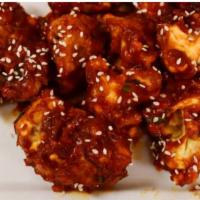 Gobi Manchurian · Not gluten-free. A classic Indo-Chinese specialty of lightly battered, marinated cauliflower...