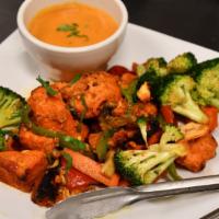 Chicken Tikka · Boneless chicken breast marinated in yogurt and freshly ground spices; cooked in a clay oven.